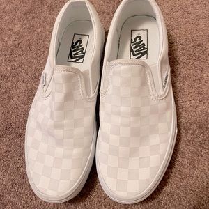 White checkered slip on vans